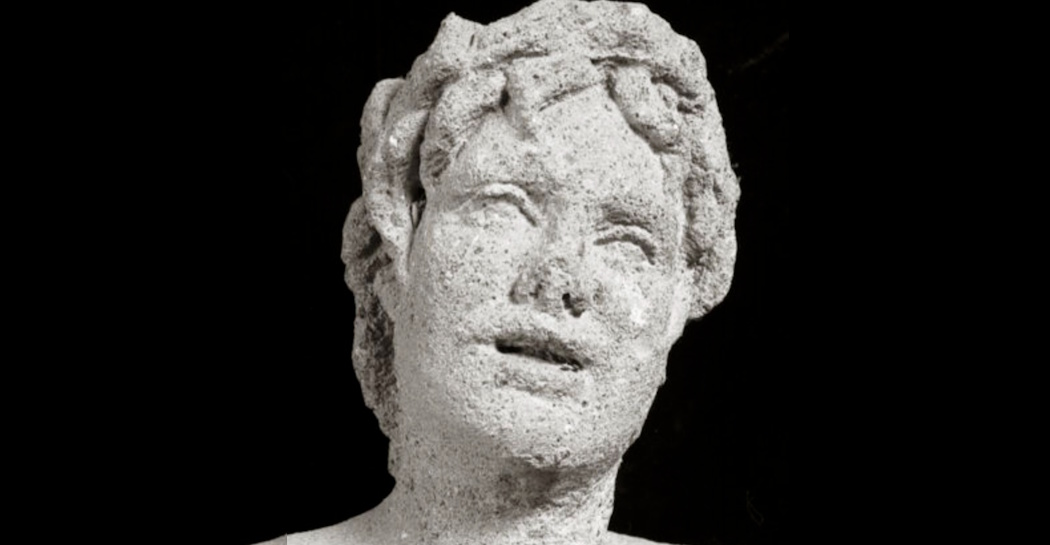 particolare (testa) della Statua di Orfeo in peperino dalla Via Tiburtina particolare (testa) della Statua di Orfeo in peperino